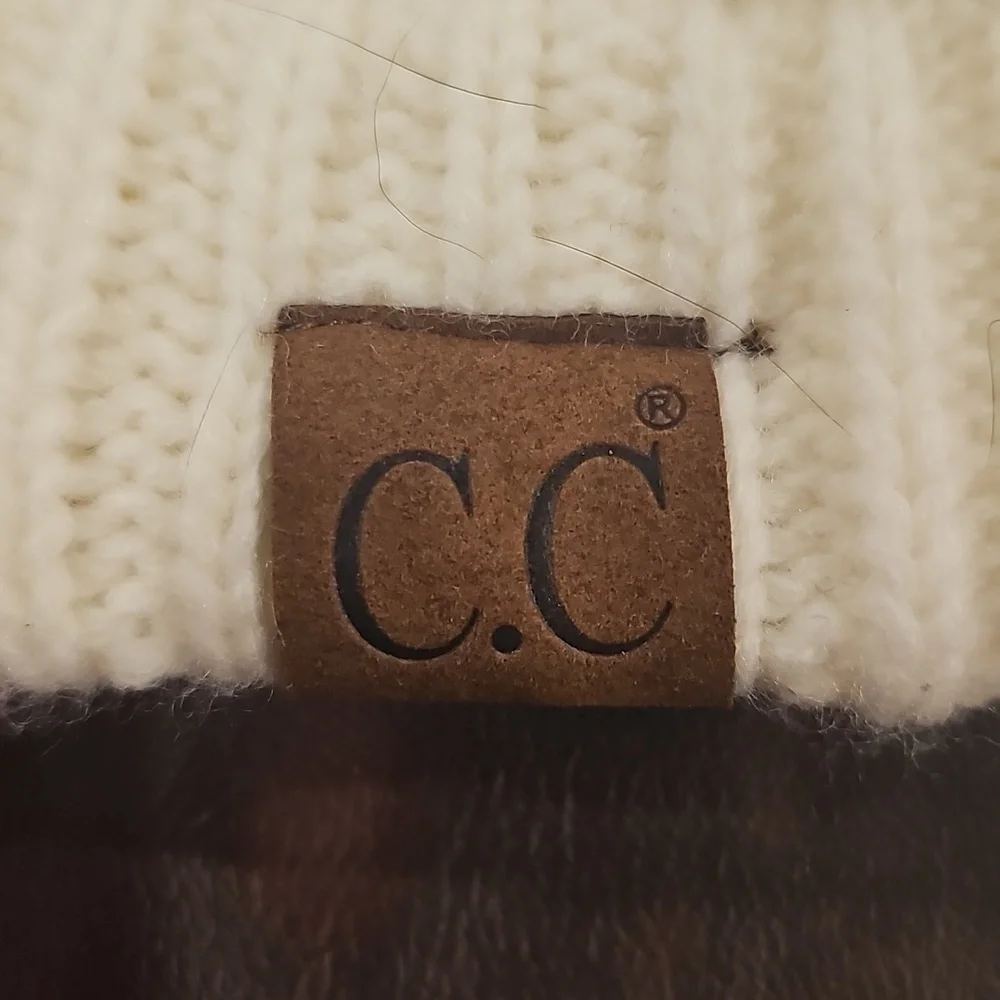 N White Knitted Hat C.C Brand No Size But Looks Great For Winter